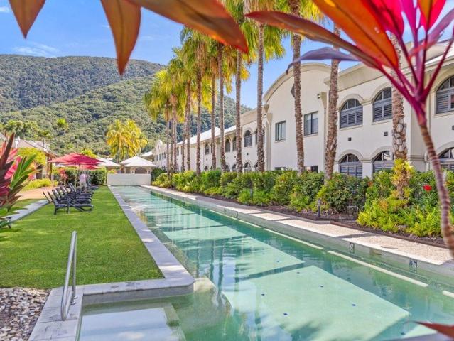 TROPICAL OASIS IN THE HEART OF HIGHLY DESIRABLE PALM COVE MOVE IN OR INVEST!