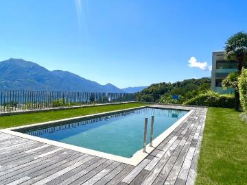 TRAUMHAFTE FERIENWOHNUNG MIT SEEBLICK IN SONNIGER LAGE CONTRA, TESSIN