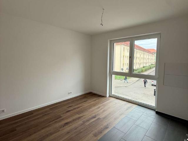 Traumhafte 3,5 Raumwohnung mit Terrasse und Tiefgaragenstellplatz WE01