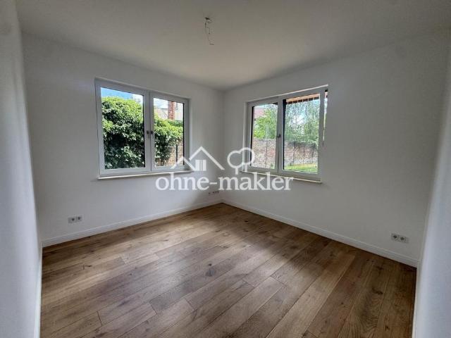 Traumhafte 4 Raumwohnung mit großem Garten in einer Villa