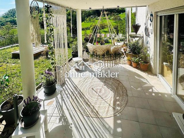 Traumhafte 4 Zimmer Eigentumswohnung mit XXL Südterrasse, Kamin und unverbaubarem Panoramablick