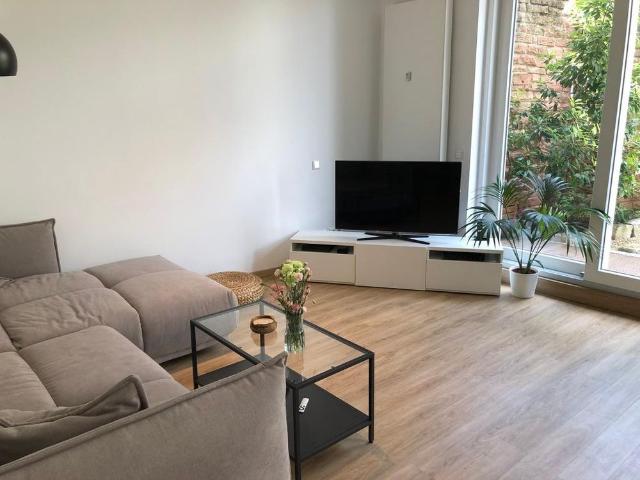 Traumhaftes Wohnen mit Loft Charakter, großer Terrasse & Garten im Herzen von Weinheim!