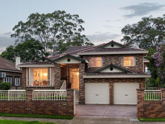 A Grand Statement in Versatility: Dual Living Luxury with Treetop Views