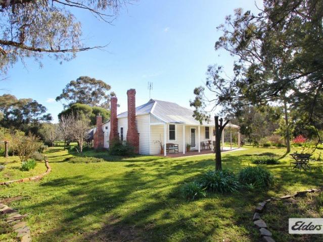 TRADITIONAL FARMHOUSE ON 20 BEATIFUL ACRES