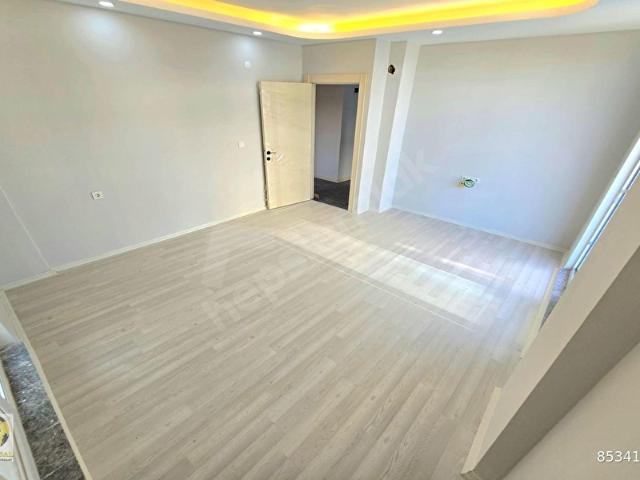 TRAMVAY DİBİ ARAKAT SIFIR İSKANLI 2+1 SATILIK DAİRE