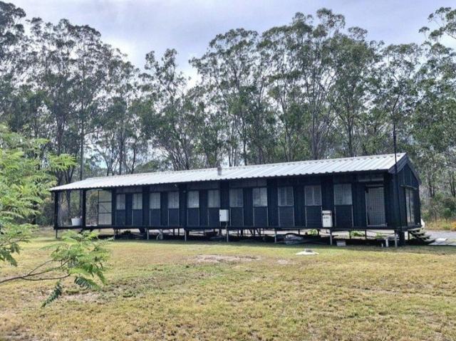TRANQUIL 40 ACRE RETREAT WITH UNIQUE HOME