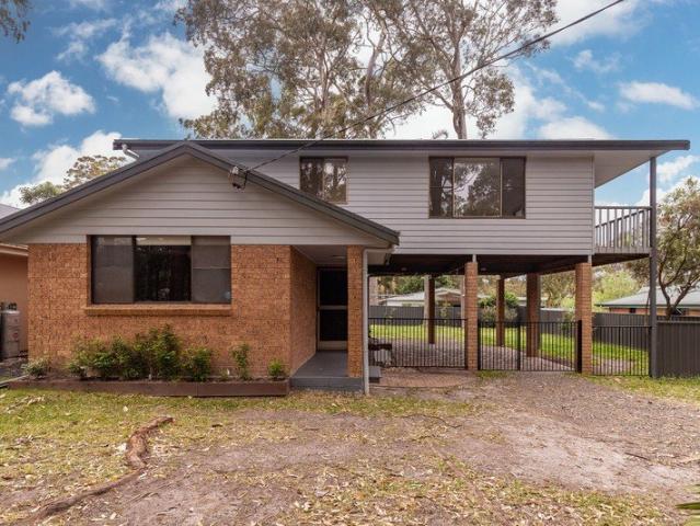 Tranquil Three Bedroom Home Minutes to the Lake