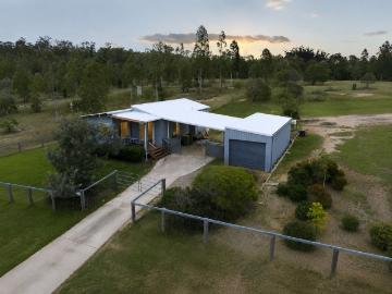Tranquil Acreage Retreat Just Minutes from Town