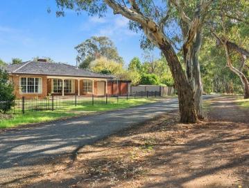 Tranquil Creekside Living with Space to Entertain