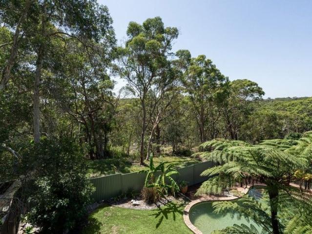Tranquil family sanctuary embraces bushland serenity