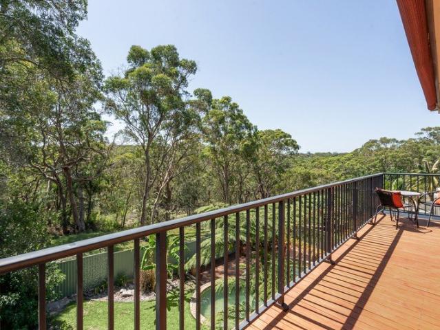 Tranquil family sanctuary embraces bushland serenity