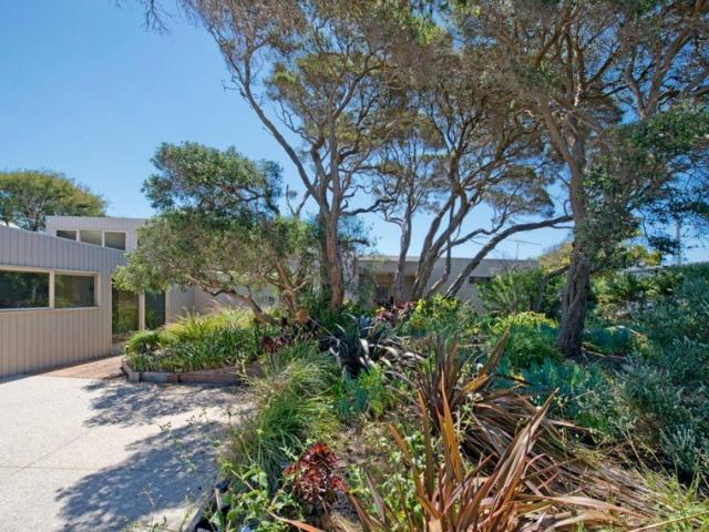 Tranquil Oceanside Living with Private Tennis Court!