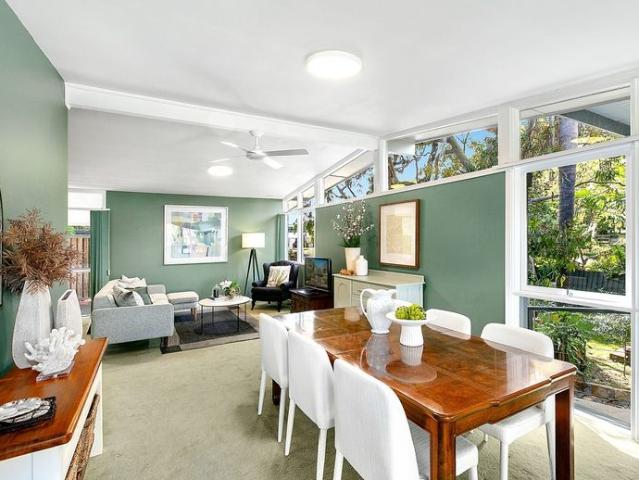 Treetop paradise basks in lagoon views – 4 Month Lease Available