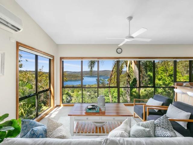 Treetop paradise basks in lagoon views – 4 Month Lease Available
