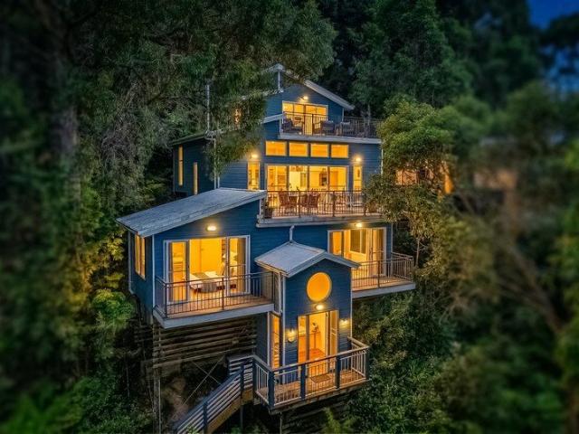 Treetop Retreat with Water Views!