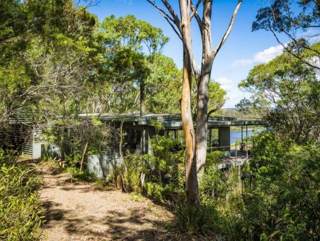 TREETOP RIVERFRONT SANCTUARY WITH BREATHTAKING VIEWS & DUAL LIVING OPTION