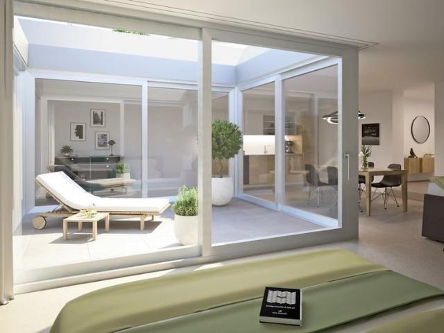 Trendige Patio Wohnung mitten in der Stadt