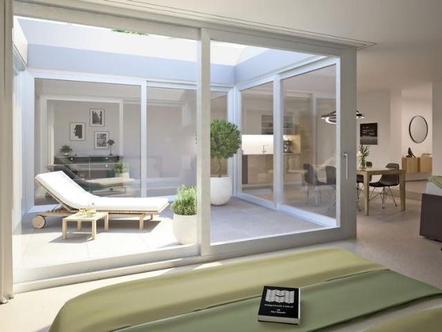 Trendige Patio Wohnung mitten in der Stadt