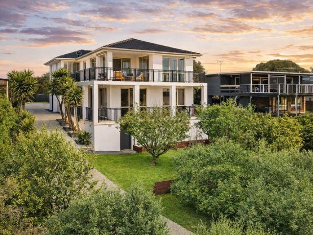 TRI LEVEL COASTAL SANCTUARY WITH FOREVER VIEWS