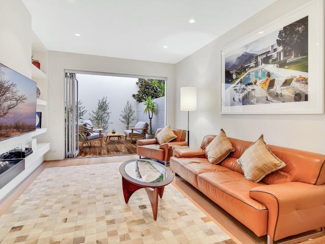 Tri Level Designer Residence on a Quiet Sought After Street