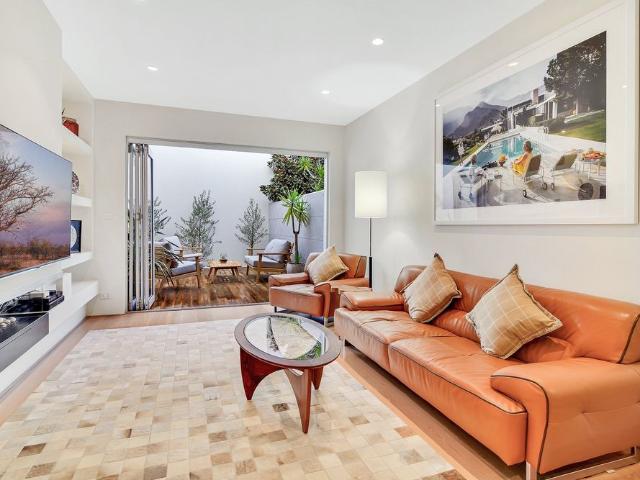 Tri Level Designer Residence on a Quiet Sought After Street