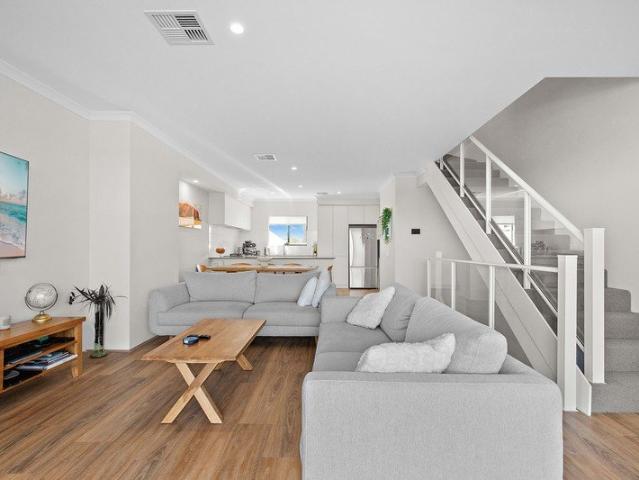 Tri level home steps from the beach
