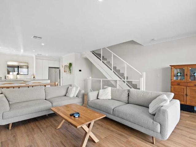 Tri level home steps from the beach