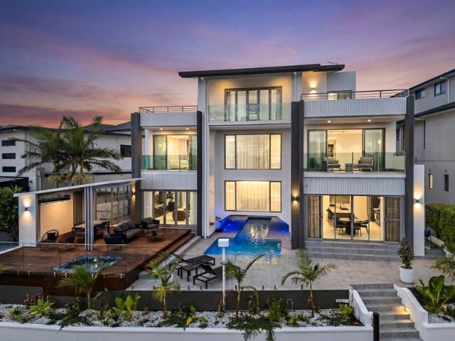 Tri Level Waterfront Masterpiece Bridge Free Boating, Private Jetty & 8 Car Luxury Basement