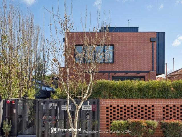 Tri Level Townhouse Living in the Heart of Elwood
