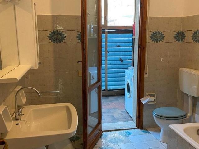 Trilocale con posto auto, balcone e giardino