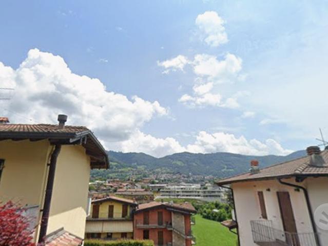 Trilocale con terrazzo e posto auto privato