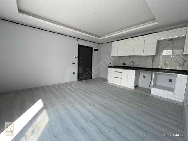 TRUVA ONUR GÜNDÜZCÜ'DEN ULAŞIMA YAKIN GENİŞ SIFIR 1+1 DAİRE