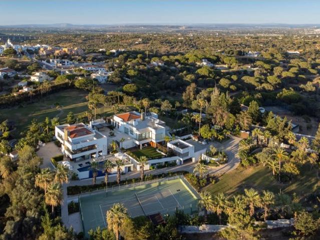 Two Contemporary Villas Inspired by Nature in Porches
