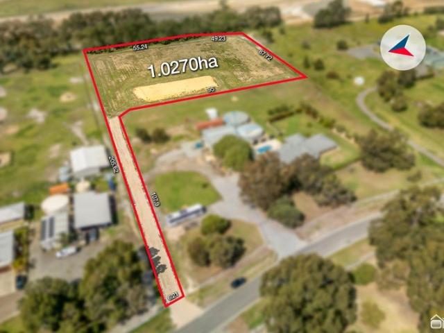 TWO AND A HALF ACRES VACANT LAND!