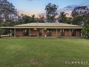 TWO AND A HALF ACRES OF SPACE, PRIVACY AND LIFESTYLE!