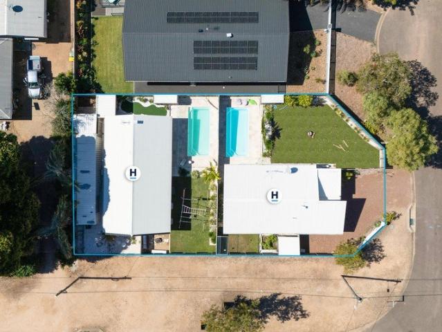 TWO ARCHITECTURALLY DESIGNED RESORT HOMES A RARE ISLAND OPPORTUNITY