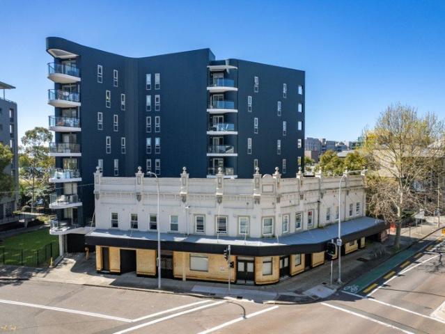 Two Balconies, Water Glimpses & a Walk Everywhere Address