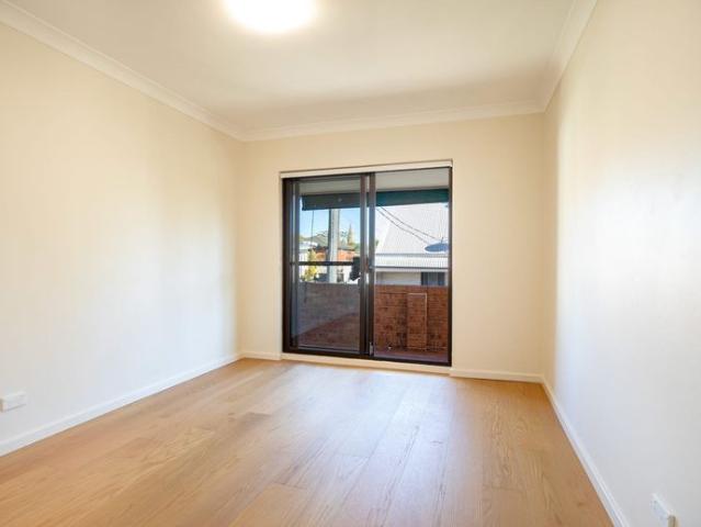 Two Bedroom Townhouse in Prime Newtown Location with Parking Access via Rear Lane