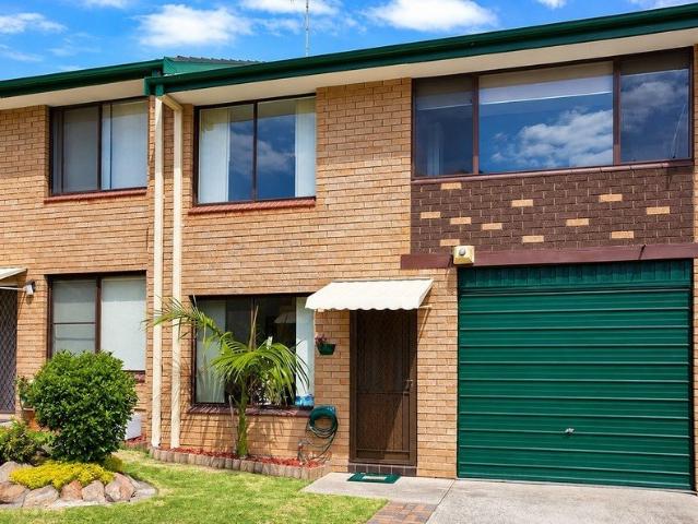 Two Bedroom Townhouse Offering Comfort and Convenience