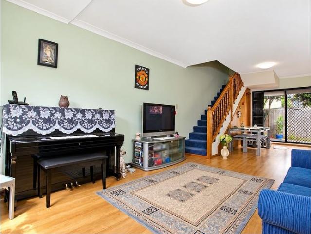 Two Bedroom Townhouse Offering Comfort and Convenience