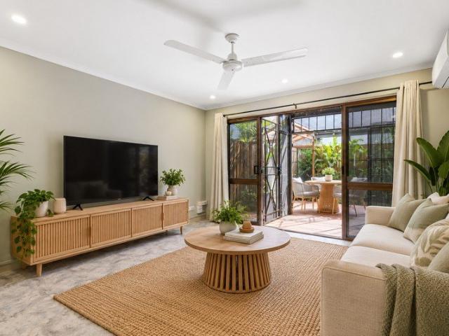 TWO BEDROOM TOWNHOUSE WITH PREMIUM UPGRADES AND PRIVATE COURTYARD
