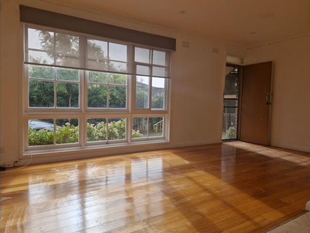 Two bedroom unit close to train and shops