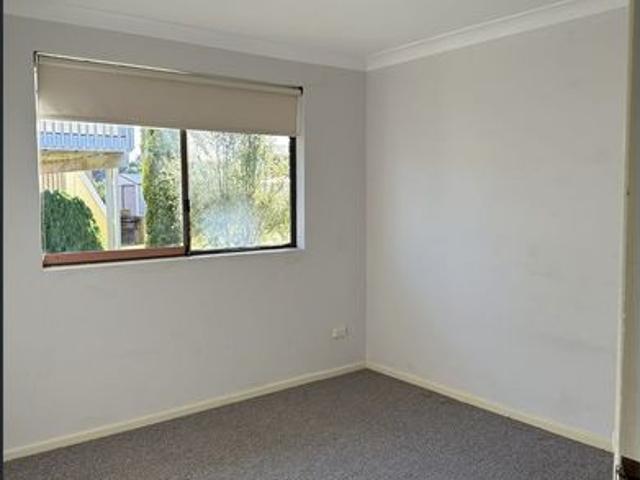 Two bedroom unit so close to town!