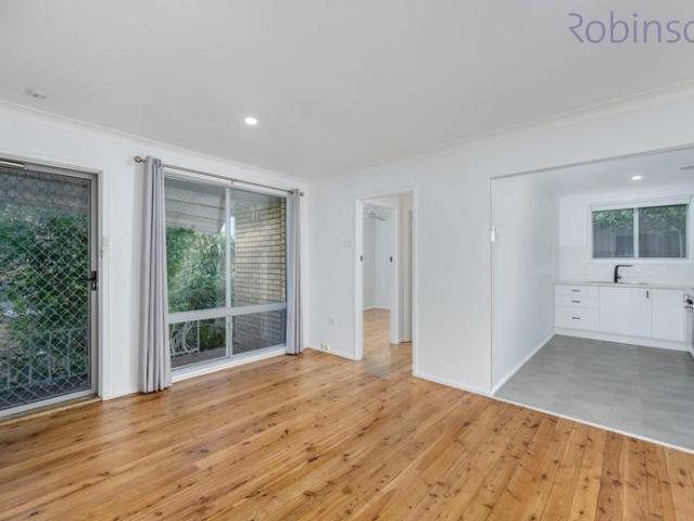 Two bedroom unit with single garage and extra carspace