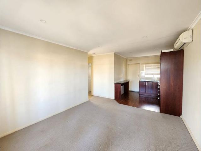 Two Bedroom Upstairs Unit with private courtyard provision
