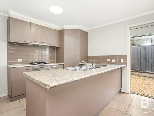 TWO BEDROOM WITH YARD IN NEAT COMPLEX