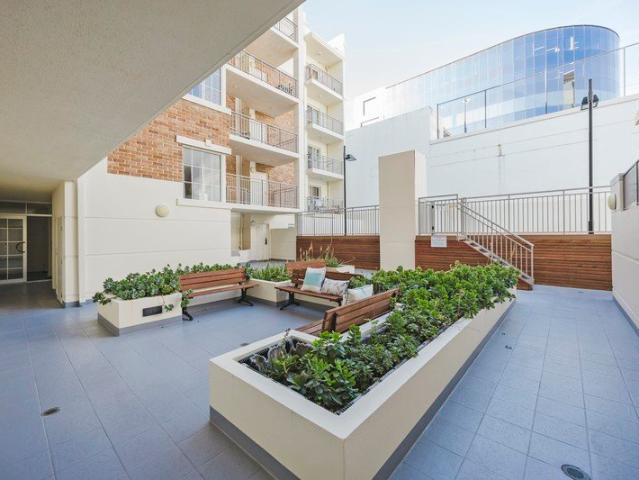 Two Bedroom Apartment with Balcony and Private Courtyard