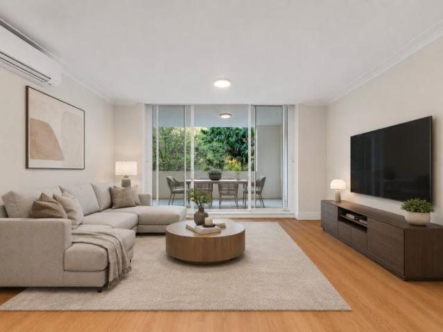 Two Bedroom Apartment with Oversized Entertainer's Balcony Freshly repainted and new flooring!