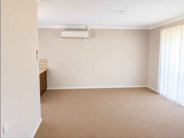 TWO BEDROOM BRICK UNIT WITH CARPORT