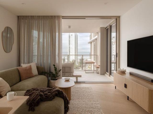 Two bedroom coastal apartment offering Lagoon resort amenities, ocean views, and parking Fully Furnished
